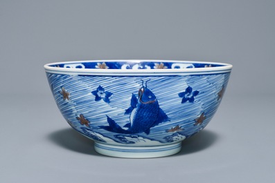 A rare Chinese blue and underglaze red bowl with carps and marine animals, Xuande mark, Kangxi